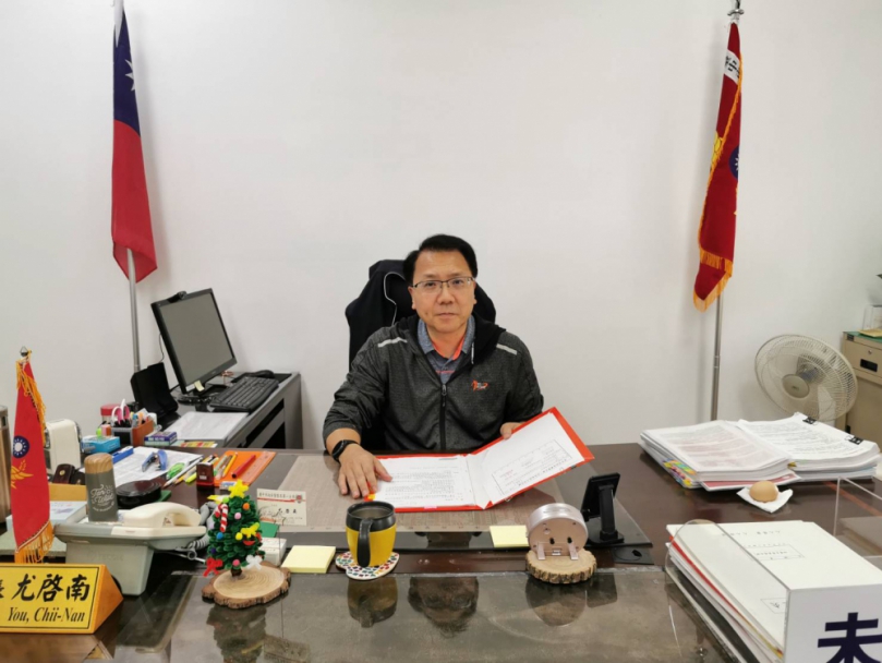 尤啟南跬步千里無私付出     中西區靖平晏安如若磐石